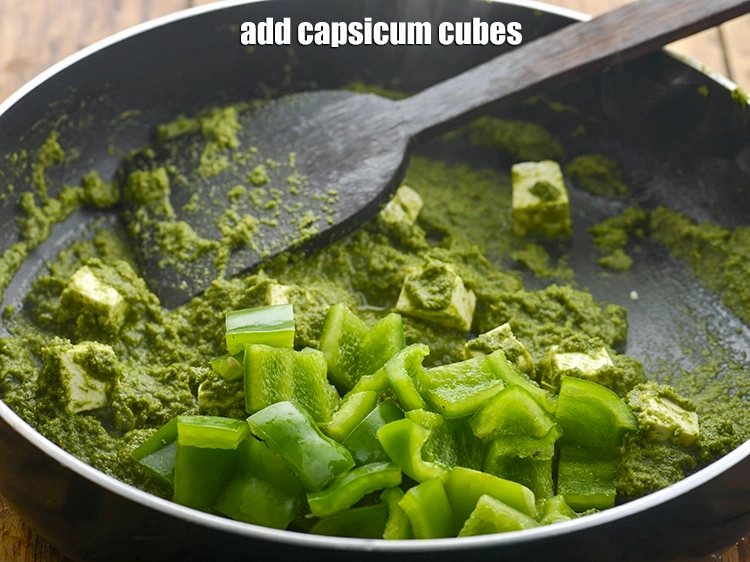 Step 21 – <p>Add <span style="background-color:rgb(255,255,255);color:rgb(0,0,0);">1/2 cup </span><a href="https://www.tarladalal.com/glossary-capsicum-shimla-mirch-bell-pepper-163i#ing_2316"><u>capsicum cubes</u></a><u>.</u></p>