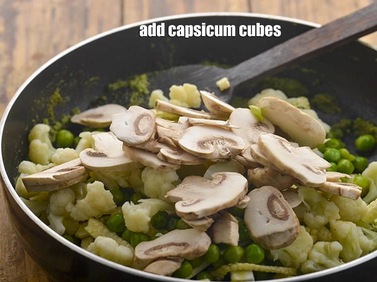 Step 25 – <p>And <span style="background-color:rgb(255,255,255);color:rgb(0,0,0);">1/2 cup thickly </span><a href="https://www.tarladalal.com/glossary-mushrooms-khumb-dhingri-493i#ing_2344"><u>sliced mushrooms (khumbh)</u></a>.&nbsp;</p>