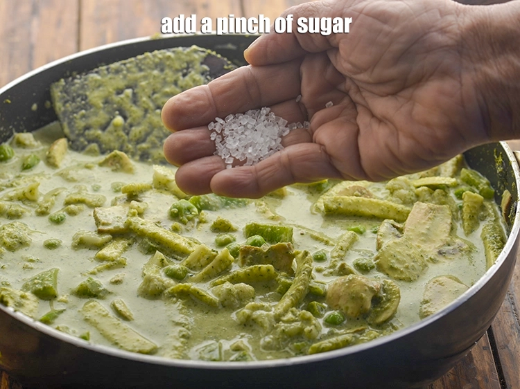 Step 28 – <p>Add the <span style="background-color:rgb(255,255,255);color:rgb(0,0,0);">a pinch of </span><a href="https://www.tarladalal.com/glossary-sugar-chini-shakkar-278i"><u>sugar</u></a><u>.</u></p>