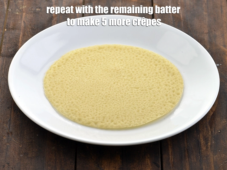Step 12 – <p><span style="background-color:rgb(255,255,255);color:rgb(0,0,0);">Repeat with the remaining batter to make 5 more <strong>crêpes</strong></span></p>