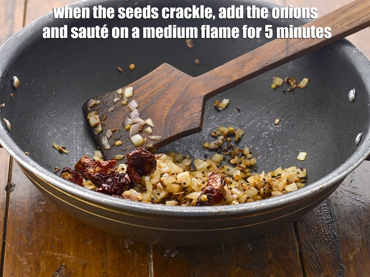 Step 17 – <p><span style="background-color:rgb(255,255,255);color:rgb(0,0,0);">When the seeds crackle, add the 1/2 cup </span><a href="https://www.tarladalal.com/glossary-onions-pyaz-pyaaz-kanda-548i#ing_2327"><u>chopped onion</u></a><span style="background-color:rgb(255,255,255);color:rgb(0,0,0);"> and <strong>sauté …