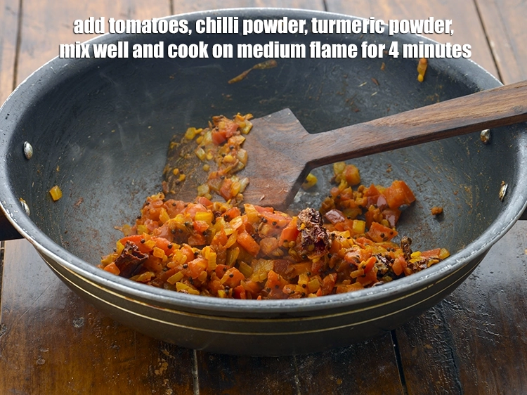 Step 18 – <p><span style="background-color:rgb(255,255,255);color:rgb(0,0,0);">Add the 1 cup </span><a href="https://www.tarladalal.com/glossary-tomatoes-tamatar-639i#ing_2361"><u>chopped tomato</u></a><span style="background-color:rgb(255,255,255);color:rgb(0,0,0);">, 1/4 tsp </span><a href="https://www.tarladalal.com/glossary-chilli-powder-red-chilli-powder-339i"><u>chilli powder</u></a><span style="background-color:rgb(255,255,255);color:rgb(0,0,0);">, …