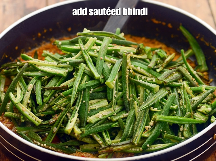 Step 19 – <p><span style="background-color:rgb(255,255,255);color:rgb(0,0,0);">Add the <strong>sautéed bhindi.</strong></span></p>