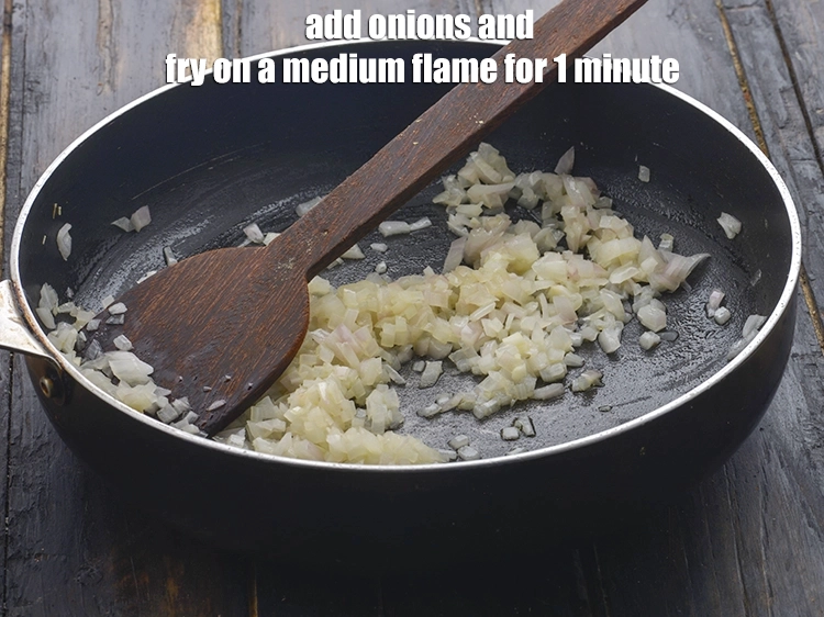 Step 4 – <p>Add the <a href="https://www.tarladalal.com/glossary-onions-pyaz-pyaaz-kanda-548i#ing_2327"><u>chopped onion</u></a> and <strong>fry</strong> on a medium flame for 1 minute.</p>
