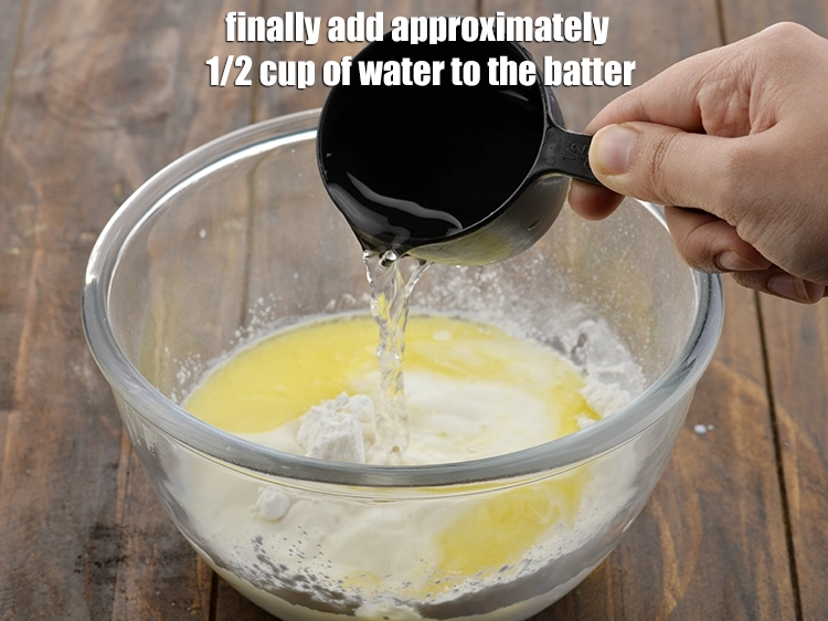 Step 6 – <p>Finally add approximately 1/2 cup of <strong>water</strong> to the batter.</p>