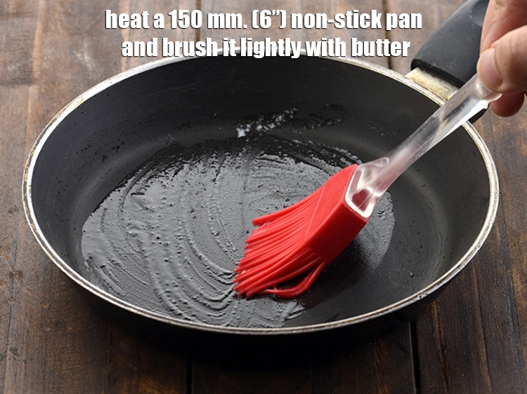 Step 8 – <p><span style="background-color:rgb(255,255,255);color:rgb(0,0,0);">Heat a 150 mm. (6”) non-stick pan and brush it lightly with </span><a href="https://www.tarladalal.com/glossary-butter-makhan-233i#ing_3123"><u>butter</u></a><span …