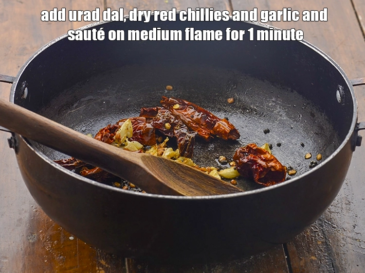Step 2 – <p><span style="background-color:rgb(255,255,255);color:rgb(0,0,0);"><strong>When the seeds crackle</strong>, add the 1/4 tsp </span><a href="https://www.tarladalal.com/glossary-urad-dal-split-black-lentil-941i"><u>urad dal (split black lentils)</u></a><span …