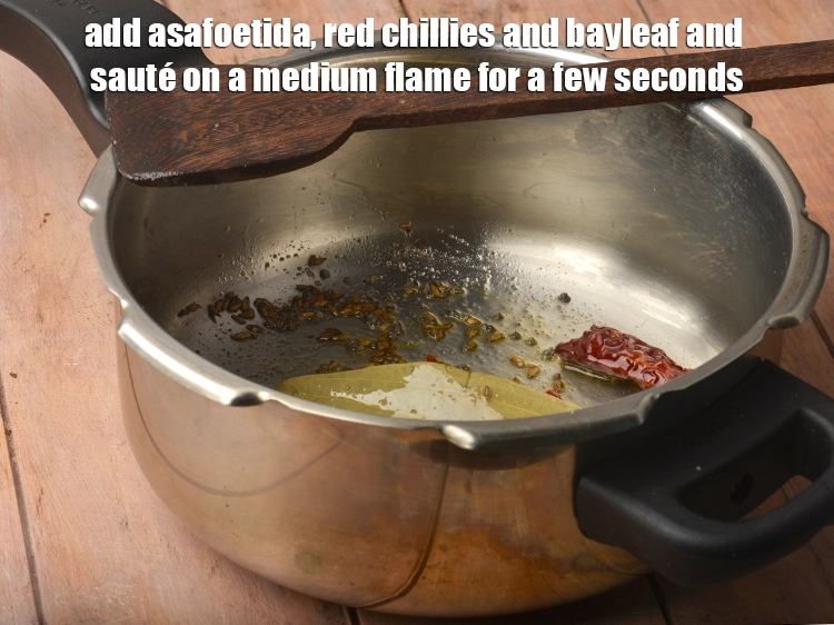 Step 2 – <p><span style="background-color:rgb(255,255,255);color:rgb(0,0,0);"><strong>When the seeds crackle</strong>, add the 1/4 tsp </span><a href="https://www.tarladalal.com/glossary-asafoetida-hing-113i"><u>asafoetida (hing)</u></a><span style="background-color:rgb(255,255,255);color:rgb(0,0,0);">, 2 </span><a …
