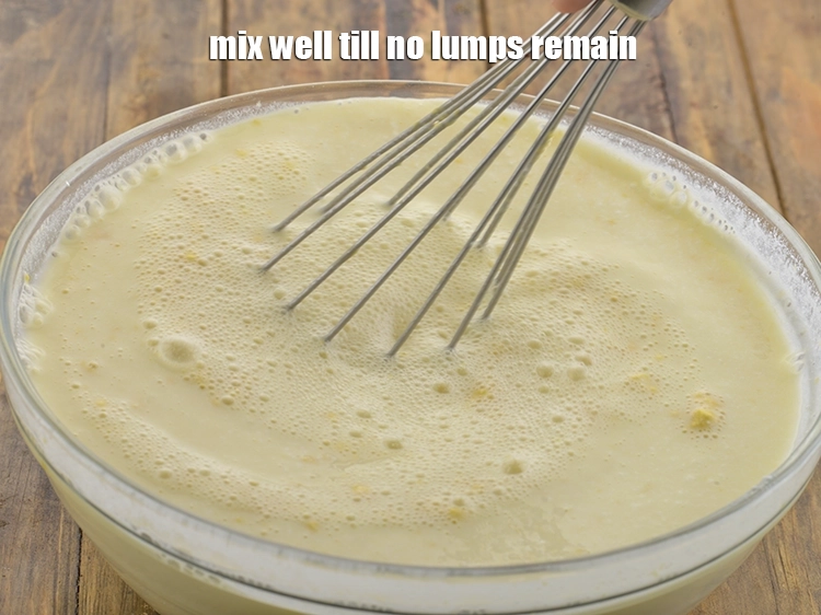 Step 8 – <p><span style="background-color:rgb(255,255,255);color:rgb(0,0,0);">Using a </span><strong>whisk</strong><span style="background-color:rgb(255,255,255);color:rgb(0,0,0);">, mix well till no lumps remain. You can use hand …