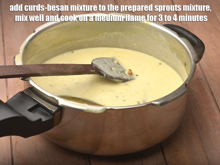 Step 9 – <p><span style="background-color:rgb(255,255,255);color:rgb(0,0,0);">Add the <strong>curds-besan mixture</strong> to the <strong>prepared sprouts mixture</strong>, mix well and cook on …