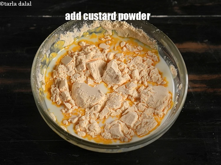 Step 2 – <p><span style="background-color:rgb(255,255,255);color:rgb(0,0,0);">Add the 2 tbsp. </span><a href="https://www.tarladalal.com/glossary-custard-powder-512i"><u>custard powder</u></a><u>.</u></p>