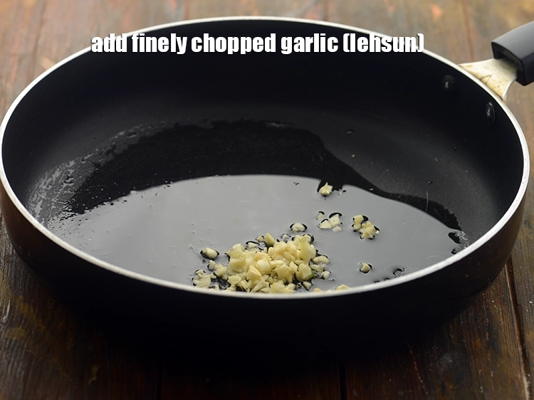 Step 9 – <p><span style="background-color:rgb(255,255,255);color:rgb(0,0,0);">Add the 1 tbsp finely </span><a href="https://www.tarladalal.com/glossary-garlic-lehsun-lahsun-348i#ing_2370"><u>chopped garlic (lehsun)</u></a><u>.</u></p>