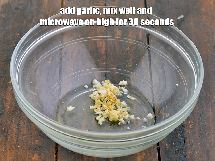Step 8 – <p><span style="background-color:rgb(255,255,255);color:rgb(0,0,0);">Add the 2 tbsp. finely </span><a href="https://www.tarladalal.com/glossary-garlic-lehsun-lahsun-348i#ing_2370"><u>chopped garlic (lehsun)</u></a><span style="background-color:rgb(255,255,255);color:rgb(0,0,0);">, mix well and <strong>microwave</strong> …
