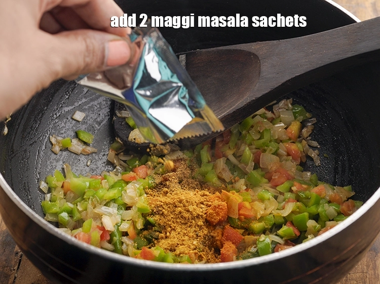 Step 16 – <p><span style="background-color:rgb(255,255,255);color:rgb(0,0,0);">Add 2 </span><a href="https://www.tarladalal.com/glossary-maggi-noodles-1362i#ing_3429"><u>maggi tastemaker</u></a><span style="background-color:rgb(255,255,255);color:rgb(0,0,0);"> sachets.</span></p>