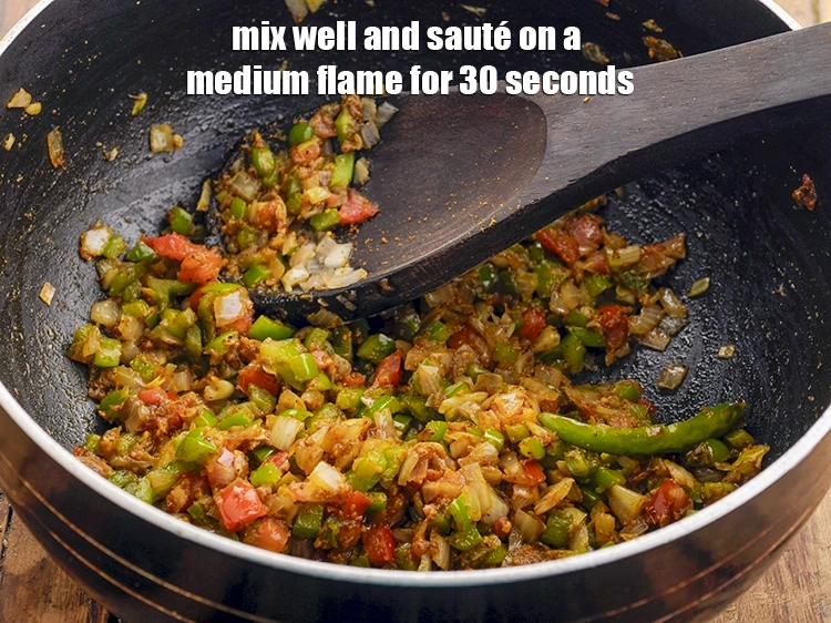 Step 17 – <p>Mix well and <strong>sauté </strong>on a medium flame for 30 seconds.</p>