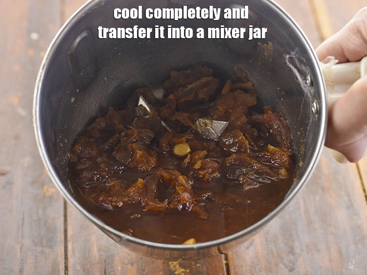 Step 9 – <p><span style="background-color:rgb(255,255,255);color:rgb(0,0,0);">Cool completely and transfer it into a mixer jar.</span></p>