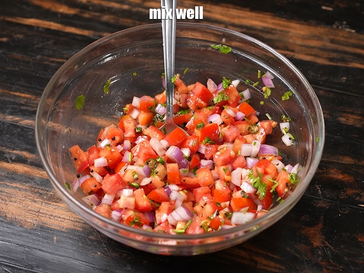 Step 14 – <p>Mix <strong>onion tomato koshimbir |&nbsp;healthy onion tomato salad&nbsp;|&nbsp;kanda tomato koshimbir&nbsp;|&nbsp;Maharashtrian tomato koshimbir&nbsp;|</strong>&nbsp;&nbsp;well.</p>