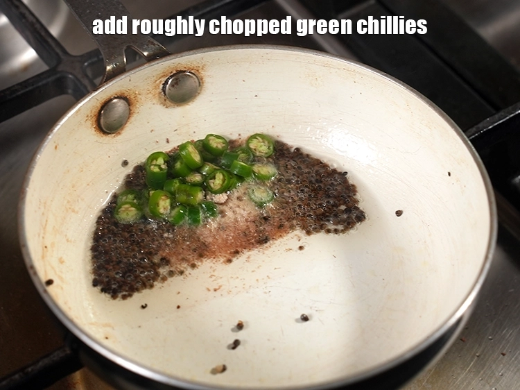 Step 11 – <html><head></head><body><p>Add&nbsp;1 1/2 tsp&nbsp;roughly&nbsp;<a href="glossary-chopped-green-chilli-820i">chopped green chillies</a>.</p></body></html>