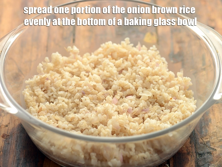 Step 30 – <p>To layer<strong>&nbsp;healthy paneer brown rice biryani</strong>&nbsp;spread one portion of the <strong>onion brown rice</strong> evenly at …
