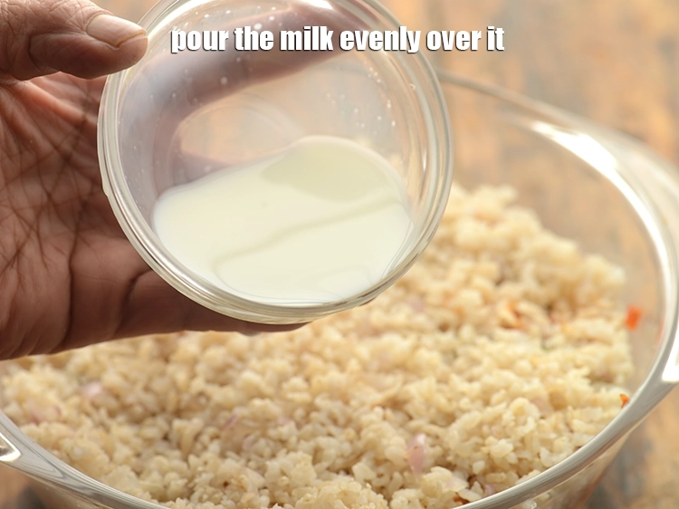 Step 33 – <p>Pour the <span style="background-color:rgb(255,255,255);color:rgb(0,0,0);">2 tbsp </span><a href="https://www.tarladalal.com/glossary-low-fat-milk-low-cal-milk-skim-milk-toned-milk-516i"><u>low fat milk </u></a><span style="background-color:rgb(255,255,255);color:rgb(0,0,0);">, 99.7% fat-free</span> evenly over …