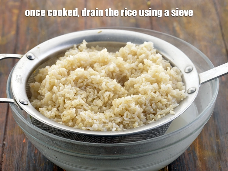 Step 9 – <p><span style="background-color:rgb(255,255,255);color:rgb(0,0,0);">Drain the brown rice well and refresh it using cold water.</span></p>