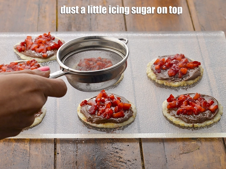 Step 11 – <p><span style="background-color:rgb(255,255,255);color:rgb(0,0,0);">Dust a little </span><a href="https://www.tarladalal.com/glossary-icing-sugar-confectioners-sugar-281i"><u>icing sugar</u></a><span style="background-color:rgb(255,255,255);color:rgb(0,0,0);">r on top.</span></p>