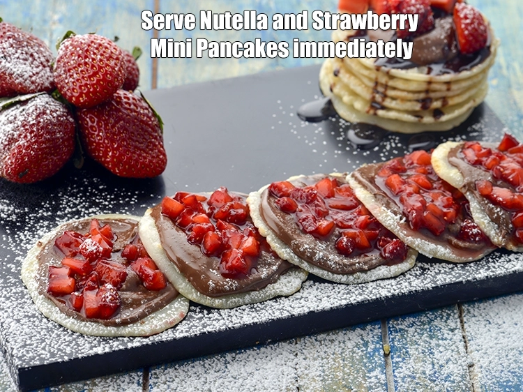 Step 12 – <p><span style="background-color:rgb(255,255,255);color:rgb(0,0,0);">Serve <strong>Nutella and Strawberry Mini Pancakes</strong> immediately.</span></p>