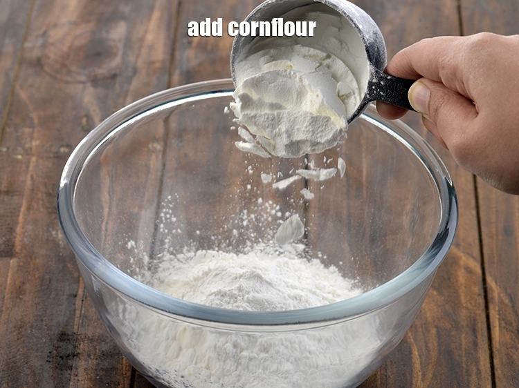 Step 2 – <p>Add <span style="background-color:rgb(255,255,255);color:rgb(0,0,0);">5 tbsp. </span><a href="https://www.tarladalal.com/glossary-cornflour-cornstarch-maize-starch-corn-flour-112i"><u>cornflour</u></a><u>.</u></p>