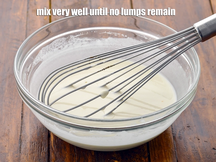 Step 5 – <p>Add <span style="background-color:rgb(255,255,255);color:rgb(0,0,0);">5 tbsp. of <strong>water </strong>and mix well using a whisk until no lumps …