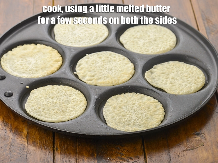 Step 8 – <p><span style="background-color:rgb(255,255,255);color:rgb(0,0,0);">Cook, using a little </span><a href="https://www.tarladalal.com/glossary-butter-makhan-233i#ing_3123"><u>melted butter</u></a><span style="background-color:rgb(255,255,255);color:rgb(0,0,0);"> for a few seconds on both …