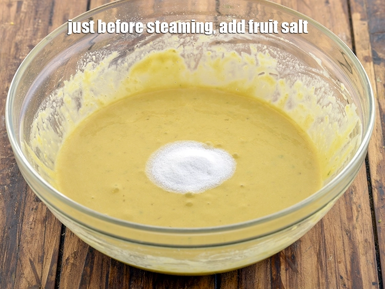 Step 10 – <p>Just before steaming, add the <span style="background-color:rgb(255,255,255);color:rgb(0,0,0);">1 tsp </span><a href="https://www.tarladalal.com/glossary-salt-namak-table-salt-418i#ing_2803"><u>fruit salt</u></a>. This will react with …