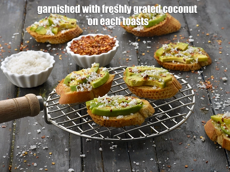 Step 8 – <p><span style="background-color:rgb(255,255,255);color:rgb(0,0,0);"><strong>Garnished</strong> with 1 tsp of freshly </span><a href="https://www.tarladalal.com/glossary-coconut-nariyal-269i#ing_3229"><u>grated coconut</u></a><span style="background-color:rgb(255,255,255);color:rgb(0,0,0);"> on each toasts.</span></p>