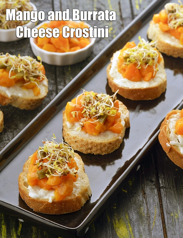 Step 10 – <p><span style="background-color:rgb(255,255,255);color:rgb(0,0,0);"><strong>Mango and Burrata Cheese Crostini</strong></span>.</p>