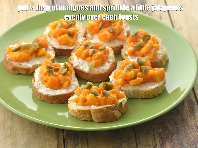 Step 7 – <p><span style="background-color:rgb(255,255,255);color:rgb(0,0,0);">Put ½ tbsp. of </span><a href="https://www.tarladalal.com/glossary-mango-aam-kairi-138i#ing_3012"><u>chopped mango</u></a><span style="background-color:rgb(255,255,255);color:rgb(0,0,0);"> and sprinkle a little </span><a href="https://www.tarladalal.com/glossary-jalapenos-canned-jalapenos-jalapeno-peppers-478i#ing_2785"><u>chopped …