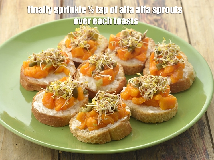 Step 8 – <p><span style="background-color:rgb(255,255,255);color:rgb(0,0,0);">Finally sprinkle ½ tsp of </span><a href="https://www.tarladalal.com/glossary-alfalfa-sprouts-alfa-alfa-sprouts-sprouted-alfa-alfa-542i"><u>alfalfa sprouts</u></a><span style="background-color:rgb(255,255,255);color:rgb(0,0,0);"> over each toasts.</span></p>