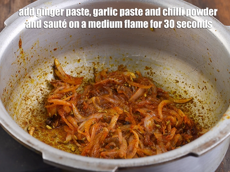 Step 12 – <p><span style="background-color:rgb(255,255,255);color:rgb(0,0,0);">Add the 1/2 tsp </span><a href="https://www.tarladalal.com/glossary-ginger-adrak-453i#ing_2753"><u>ginger (adrak) paste</u></a><span style="background-color:rgb(255,255,255);color:rgb(0,0,0);">, 1/2 tsp </span><a href="https://www.tarladalal.com/glossary-garlic-lehsun-lahsun-348i#ing_2752"><u>garlic (lehsun) …