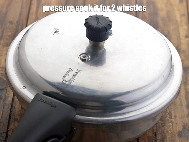 Step 15 – <p><span style="background-color:rgb(255,255,255);color:rgb(0,0,0);">Pressure cook it for 2 whistles.</span></p>