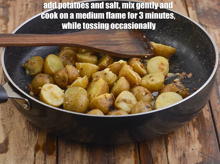 Step 4 – <p><span style="background-color:rgb(255,255,255);color:rgb(0,0,0);">Add the 1 1/2 cups </span><a href="https://www.tarladalal.com/glossary-baby-potatoes-chote-aloo-715i#ing_2702"><u>boiled baby potato halves</u></a><span style="background-color:rgb(255,255,255);color:rgb(0,0,0);"> and </span><a href="https://www.tarladalal.com/glossary-salt-namak-table-salt-418i"><u>salt …