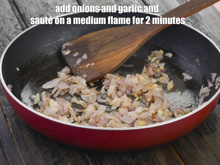 Step 3 – <p><span style="background-color:rgb(255,255,255);color:rgb(0,0,0);">Add the 1/2 cup </span><a href="https://www.tarladalal.com/glossary-onions-pyaz-pyaaz-kanda-548i#ing_2327"><u>chopped onion</u></a><span style="background-color:rgb(255,255,255);color:rgb(0,0,0);"> and 1 tsp finely </span><a href="https://www.tarladalal.com/glossary-garlic-lehsun-lahsun-348i#ing_2370"><u>chopped …