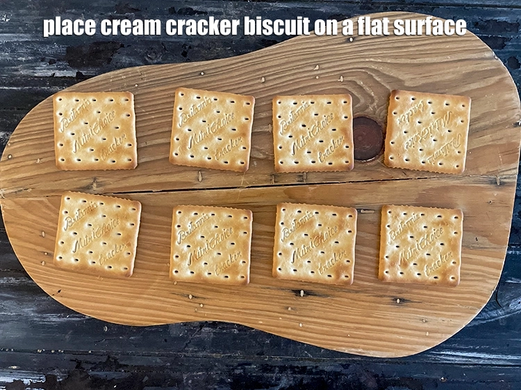 Step 5 – <p>Place 4 <a href="https://www.tarladalal.com/glossary-cream-cracker-biscuit-206i"><u>cream cracker biscuit</u></a> on a flat surface.</p>