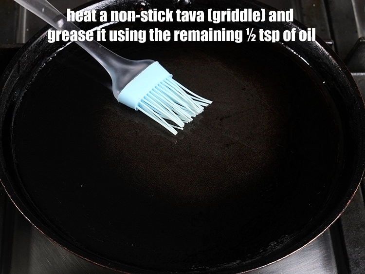 Step 9 – <p><span style="background-color:rgb(255,255,255);color:rgb(0,0,0);">Heat a non-stick tava (griddle) and grease it using the remaining ½ tsp of …
