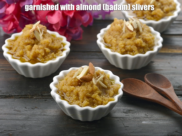 Step 6 – <p><span style="background-color:rgb(255,255,255);color:rgb(0,0,0);">Garnished with 4 tsp </span><a href="https://www.tarladalal.com/glossary-almond-slivers-slivered-almonds-664i"><u>almond (badam) slivers</u></a><span style="background-color:rgb(255,255,255);color:rgb(0,0,0);">.</span></p>
