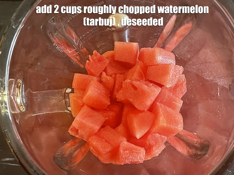 Step 2 – <p>Add the <span style="background-color:rgb(255,255,255);color:rgb(0,0,0);">2 cups roughly </span><a href="https://www.tarladalal.com/glossary-watermelon-tarbuj-kalingar-34i#ing_2970"><u>chopped watermelon (tarbuj) </u></a><span style="background-color:rgb(255,255,255);color:rgb(0,0,0);">, deseeded.</span></p>