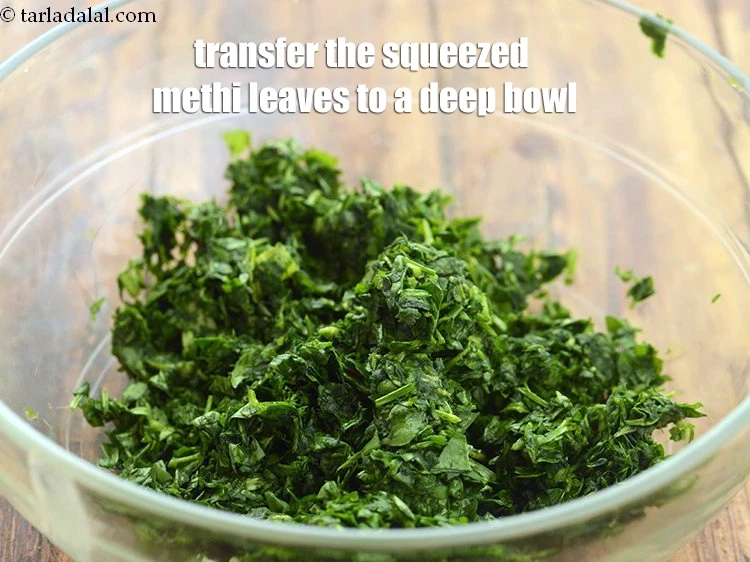 Step 6 – <p><span style="background-color:rgb(255,255,255);color:rgb(0,0,0);">Transfer the squeezed 1/2 cup finely </span><a href="https://www.tarladalal.com/glossary-fenugreek-leaves-methi-methi-leaves-methi-ke-patte-methi-ki-bhaji-373i#ing_2382"><u>chopped fenugreek leaves (methi)</u></a><span style="background-color:rgb(255,255,255);color:rgb(0,0,0);"> to a …