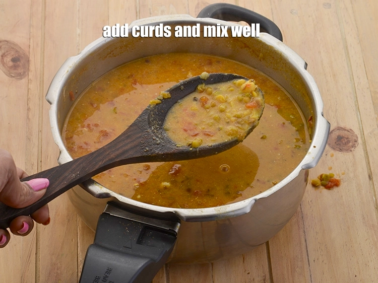 Step 10 – <p><span style="background-color:rgb(255,255,255);color:rgb(0,0,0);">Add the 1/3 cup </span><a href="https://www.tarladalal.com/glossary-curd-dahi-yogurt-yoghurt-383i#ing_3131"><u>whisked curds (dahi)</u></a><span style="background-color:rgb(255,255,255);color:rgb(0,0,0);"> and mix well.</span></p>