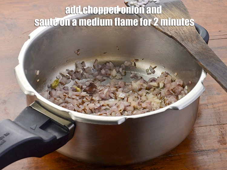 Step 5 – <p><span style="background-color:rgb(255,255,255);color:rgb(0,0,0);">Add the 1/2 cup </span><a href="https://www.tarladalal.com/glossary-onions-pyaz-pyaaz-kanda-548i#ing_2327"><u>chopped onion</u></a><span style="background-color:rgb(255,255,255);color:rgb(0,0,0);"> and <strong>sauté</strong> on a medium flame …