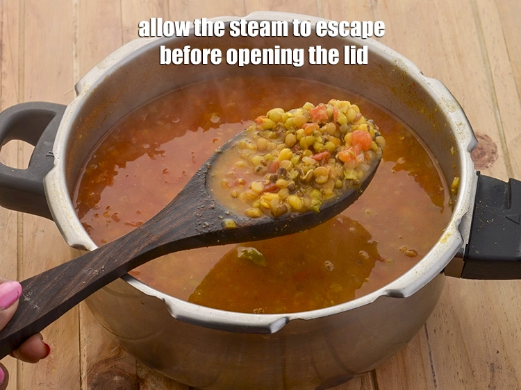 Step 9 – <p><span style="background-color:rgb(255,255,255);color:rgb(0,0,0);">Allow the steam to escape before opening the lid. looks like after pressure cooking.</span></p>