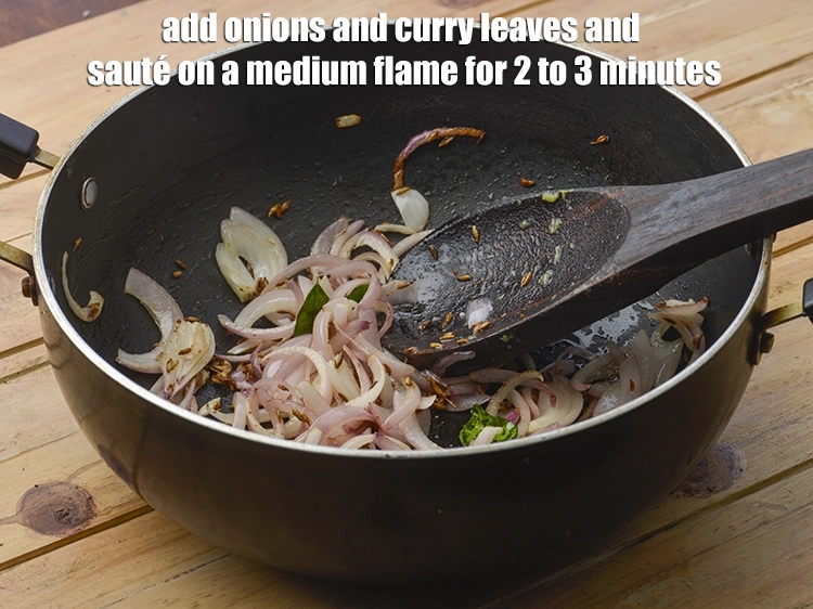 Step 9 – <p><span style="background-color:rgb(255,255,255);color:rgb(0,0,0);"><strong>When the seeds crackle</strong>, add the 1/2 cup </span><a href="https://www.tarladalal.com/glossary-onions-pyaz-pyaaz-kanda-548i#ing_2342"><u>sliced onions</u></a><span style="background-color:rgb(255,255,255);color:rgb(0,0,0);"> and 6 …
