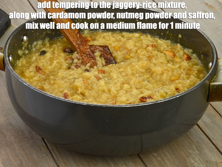 Step 6 – <p><span style="background-color:rgb(255,255,255);color:rgb(0,0,0);">Add the <strong>tempering</strong> to the <strong>jaggery-rice mixture</strong>, along with 1 tsp </span><a href="https://www.tarladalal.com/glossary-cardamom-powder-elaichi-powder-265i"><u>cardamom (elaichi) …