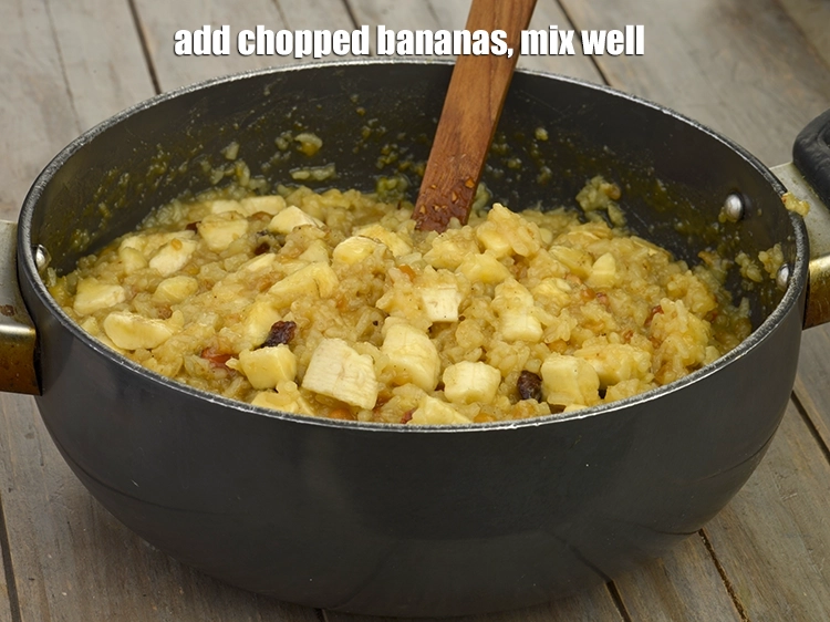 Step 7 – <p><span style="background-color:rgb(255,255,255);color:rgb(0,0,0);">Add the 1 1/2 cups </span><a href="https://www.tarladalal.com/glossary-banana-kela-17i#ing_2965"><u>chopped bananas</u></a><span style="background-color:rgb(255,255,255);color:rgb(0,0,0);">, mix well.</span></p>